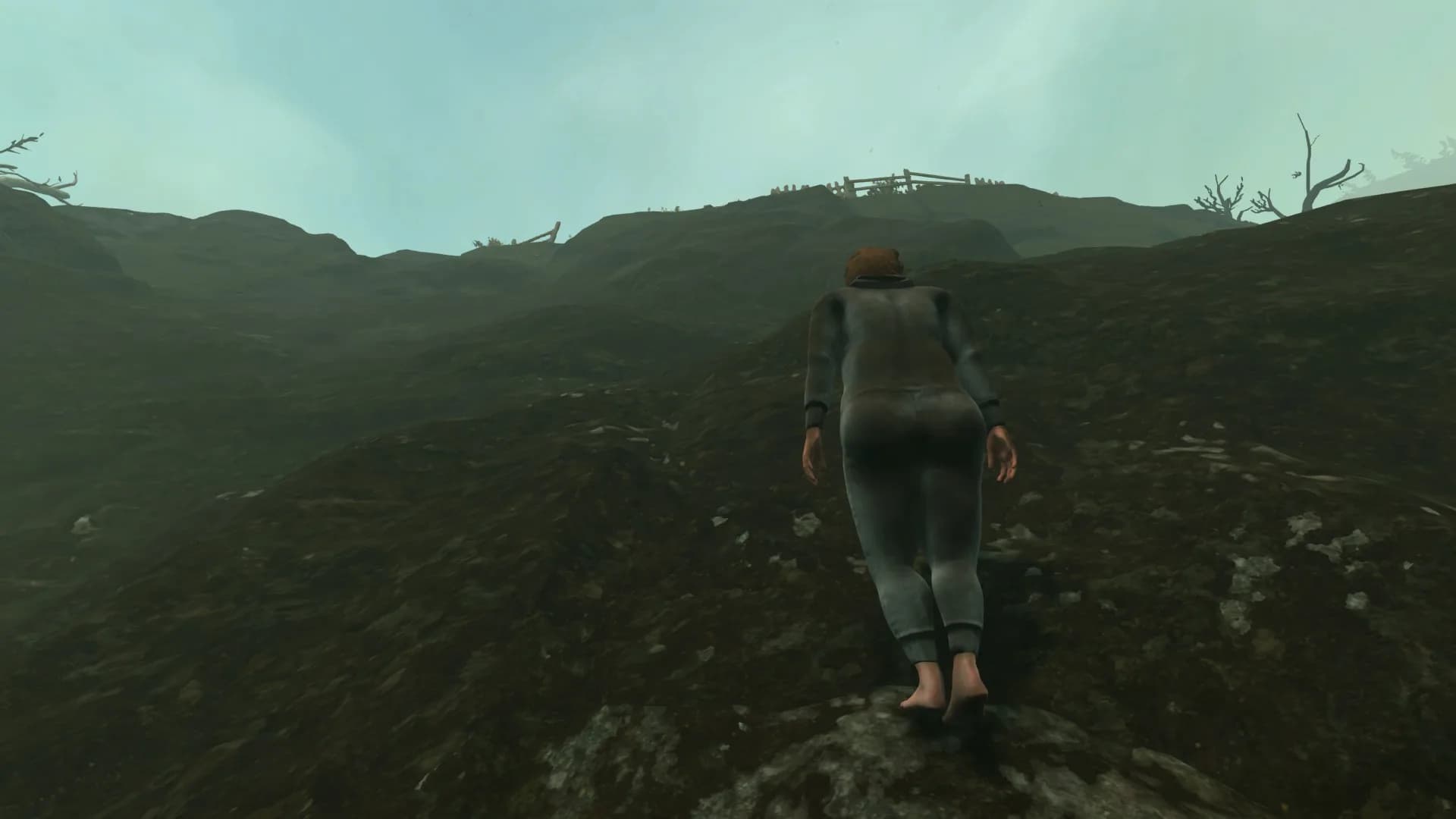 《一步一脚印》游戏截图:主角攀爬陡峭山坡的瞬间