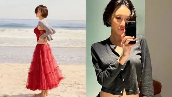 华莎的海边写真照片,身穿红色蕾丝背心搭配蓬鬆长纱裙,展现纤细腰线与自信魅力